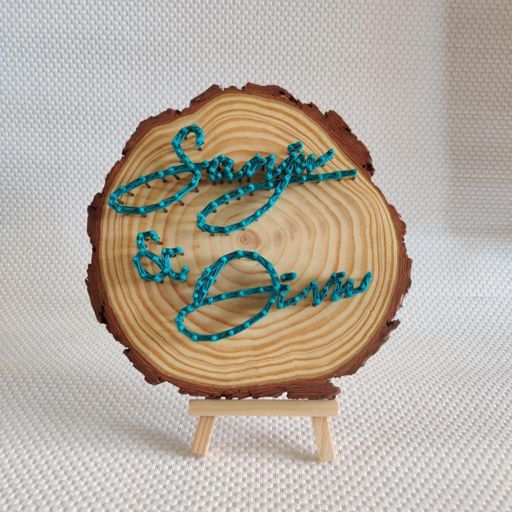 Wooden Wonder Custom Name String Art on Rustic Wood Slice