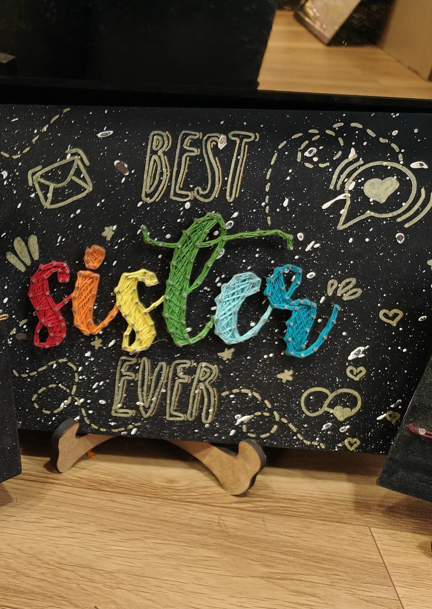 Sisterly Stitches: A Tapestry of Love string art