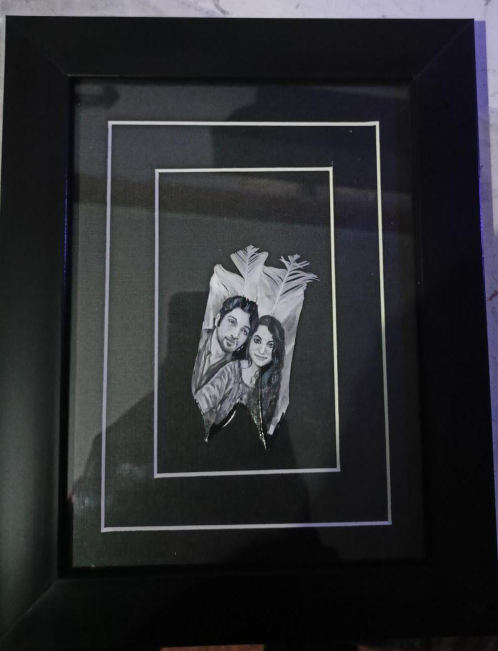 Feathered Moments: Handcrafted Portrait Frames