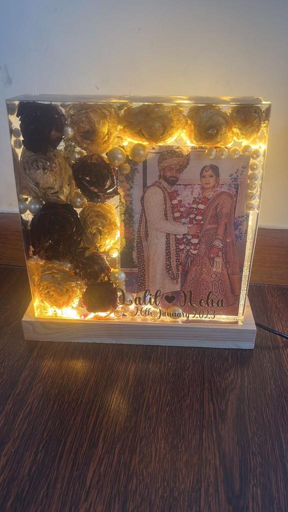 Luminous Vows: LED Wooden Stand Featuring Resin Varmala Preservation Photo Frame