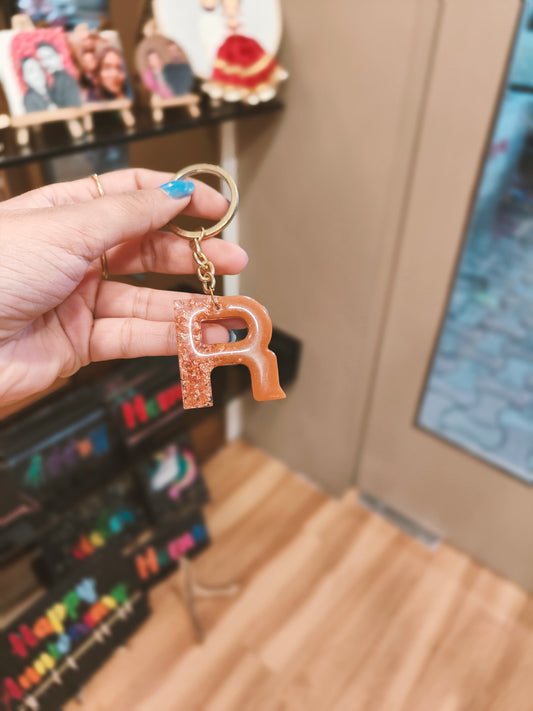 Radiant 'R' Resin Keychain