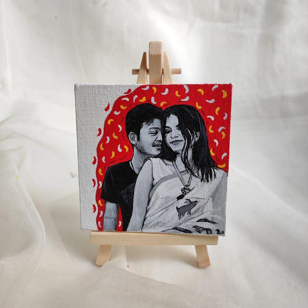 Chromatic Love: Hand-Painted Black and White Couple Portrait with a Burst of Colors
