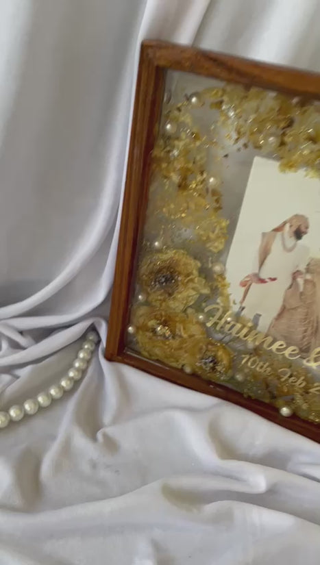 Love's Forever Frame: Resin Varmala Preservation in Wooden Frame with Couples' Picture