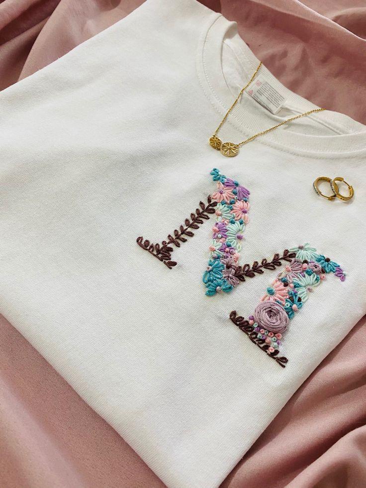 Stitch Crafted Tees: Hand-Embroidered Apparel